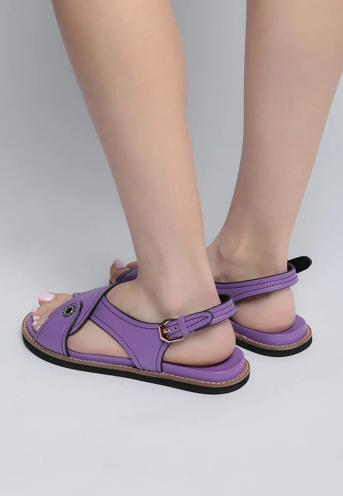 A pair of women's classic flat sole sandals, perfect for summer and designed for maximum comfort.