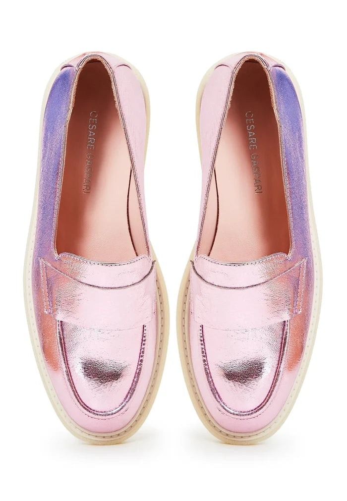 A pair of stylish flat sole metallic pink women's loafers, perfect for those looking for fashionable and comfortable footwear.