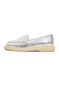 A pair of stylish silver women's loafers with a flat sole, perfect slip-on shoes for any casual or formal outfit.