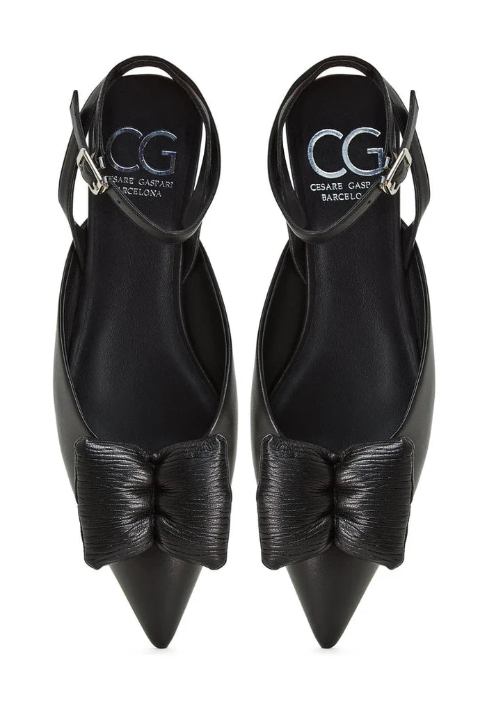 A pair of black Gabriela slingback ballerinas with a flat sole, perfect for women seeking comfortable black flats with a stylish touch.