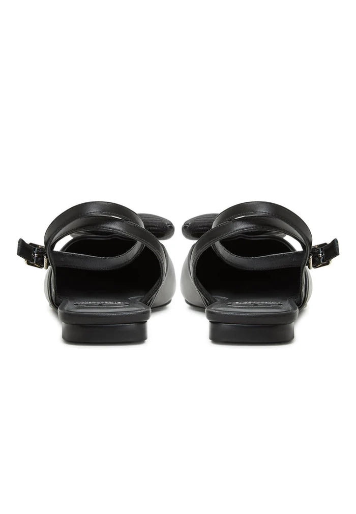 A pair of stylish and comfortable black slingback ballerinas with a flat sole, known as Gabriela black shoes, perfect for women seeking chic and comfortable black flats.