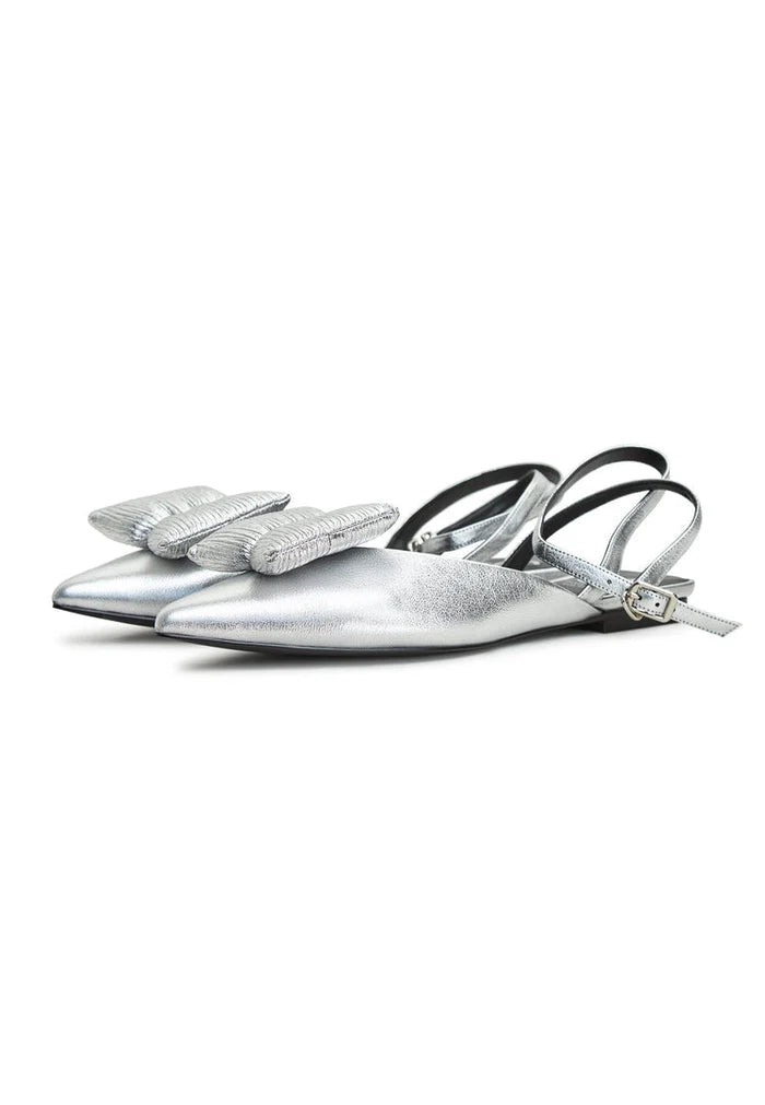A stylish pair of silver flat sole slingback ballerinas by Gabriela shoes for women.