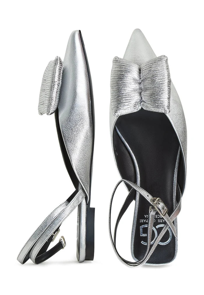 A stylish pair of silver flat sole slingback ballerinas, known as Gabriela shoes, for women.
