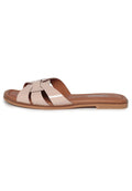 A pair of trendy beige slides with a gloss weave design, stylish summer shoes for a fashionable look.