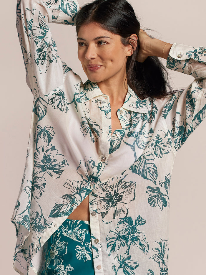 White Hau Lana long-sleeved top with green floral print and green patterned pants, shown from front and side views.