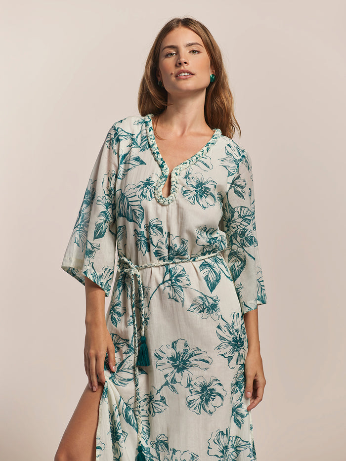 Green floral cotton voile midi caftan with braided belt and 3/4 sleeves, front view.