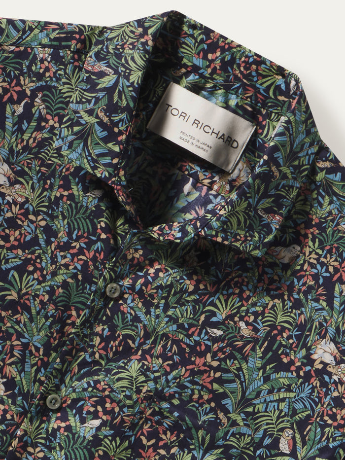 Navy tropical floral-print short-sleeve shirt, Tori Richard label on collar, front view shown.