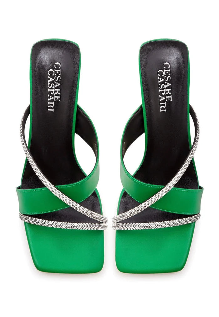 A stylish pair of green women's high heels sandals with strappy design, perfect for adding a fashionable touch to any outfit.