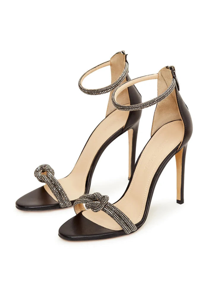 A stylish pair of elegant black high heel sandals with exquisite jewel embellishments, perfect for fashionable women.