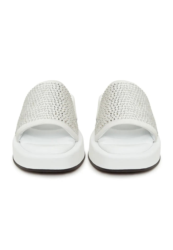 A stylish pair of white platform mule sandals with jewel embellishments, perfect for adding a touch of glamour to any outfit. Ideal high heel platform shoes that are a must-have in women's fashion footwear collections.