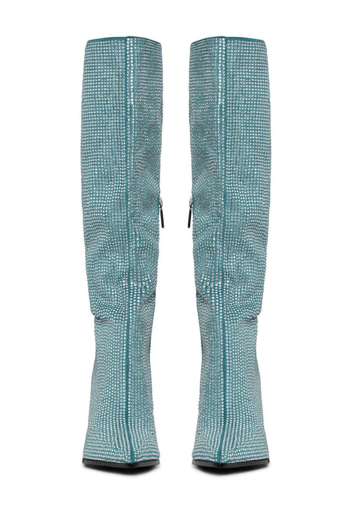 A stylish pair of knee-high Mili boots in blue with jewel embellishments and stiletto heels.