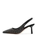 A stylish pair of black women's suede high heeled pumps, known as Samantha pumps, perfect for adding a touch of elegance to any outfit.