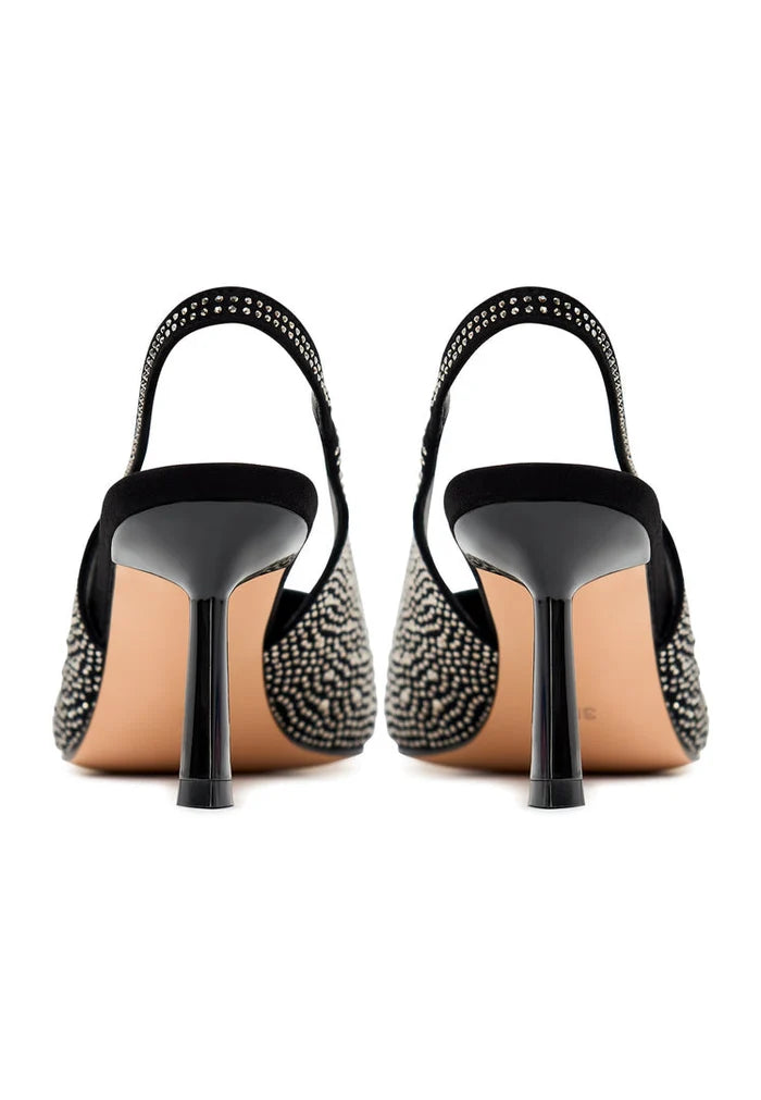 A stylish pair of black Samantha pumps, featuring jewel suede material, high heels, and perfect for wearing as women's suede heels.
