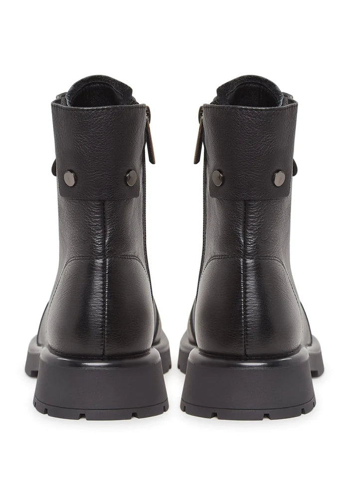 A trendy pair of lace-up ankle boots with a platform sole, perfect for women's fashion footwear.