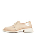A stylish pair of men's beige leather lace-up loafers, perfect for any occasion.