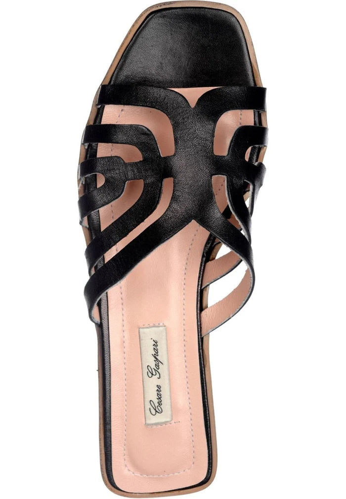 A stylish pair of black laser cut sandals, perfect for any occasion.