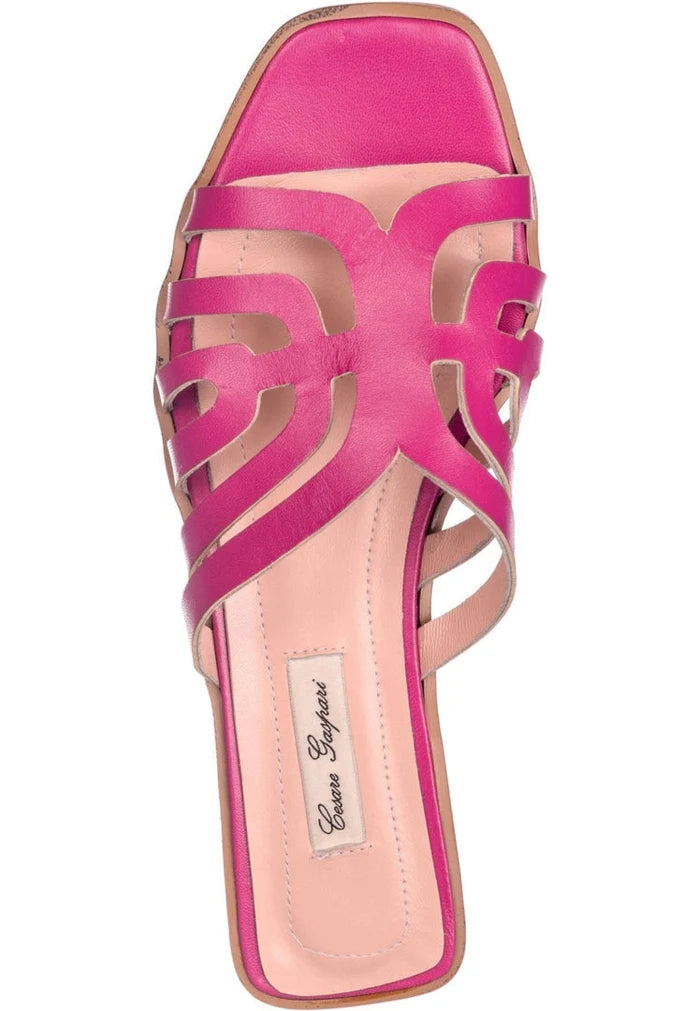 Stylish pink women's laser cut sandals, perfect for a chic and trendy look.
