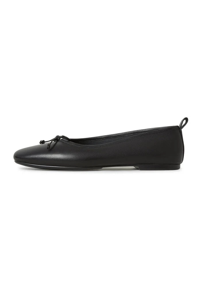 A stylish pair of black leather ballerina shoes for women, featuring the Mila design.