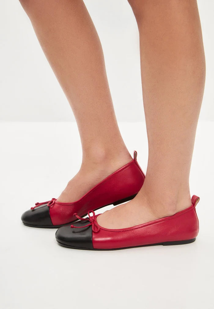 A stylish pair of red leather ballerinas, known as Mila ballerinas, perfect for women looking for comfortable ballet flats.