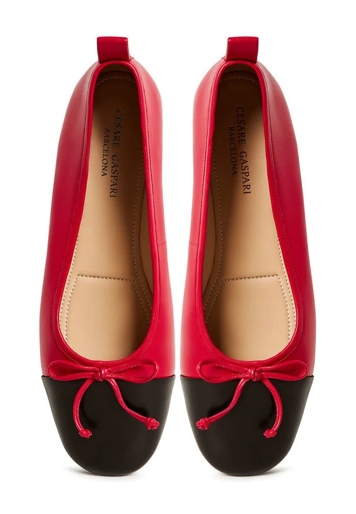 A stylish pair of women's leather ballerinas in vibrant red, the Mila ballerinas, offering both style and comfort as the perfect choice for comfortable ballet flats.