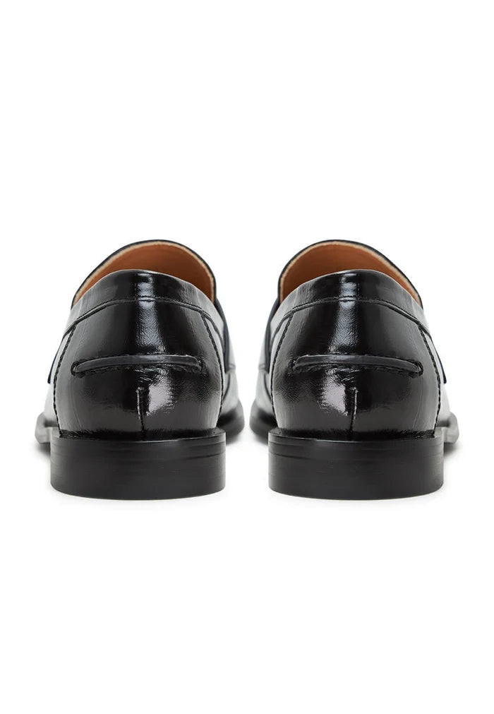 A stylish pair of women's black leather block heeled loafers - the perfect combination of comfort and sophistication.