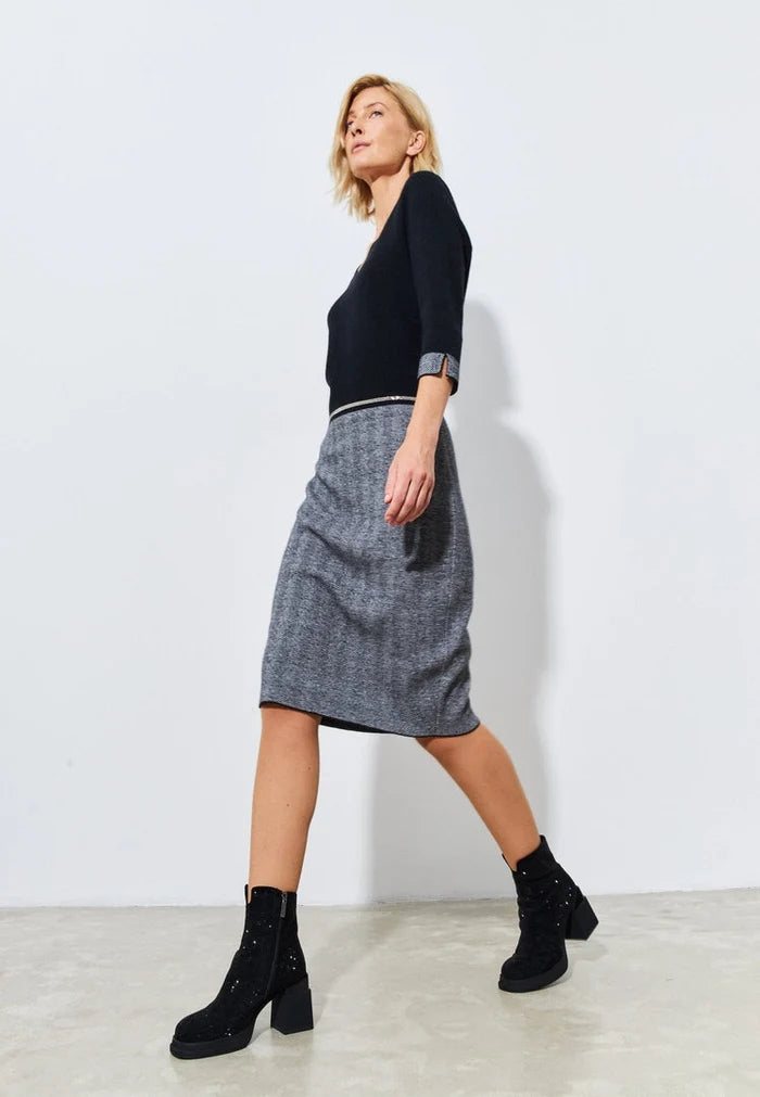 A stylish pair of women's black leather ankle boots with a trendy block heel - the perfect fashion boots for any outfit.