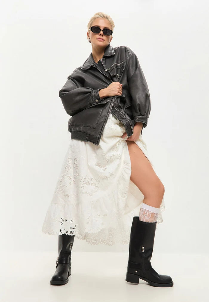 A stylish pair of black Lily high-quality leather boots for women.