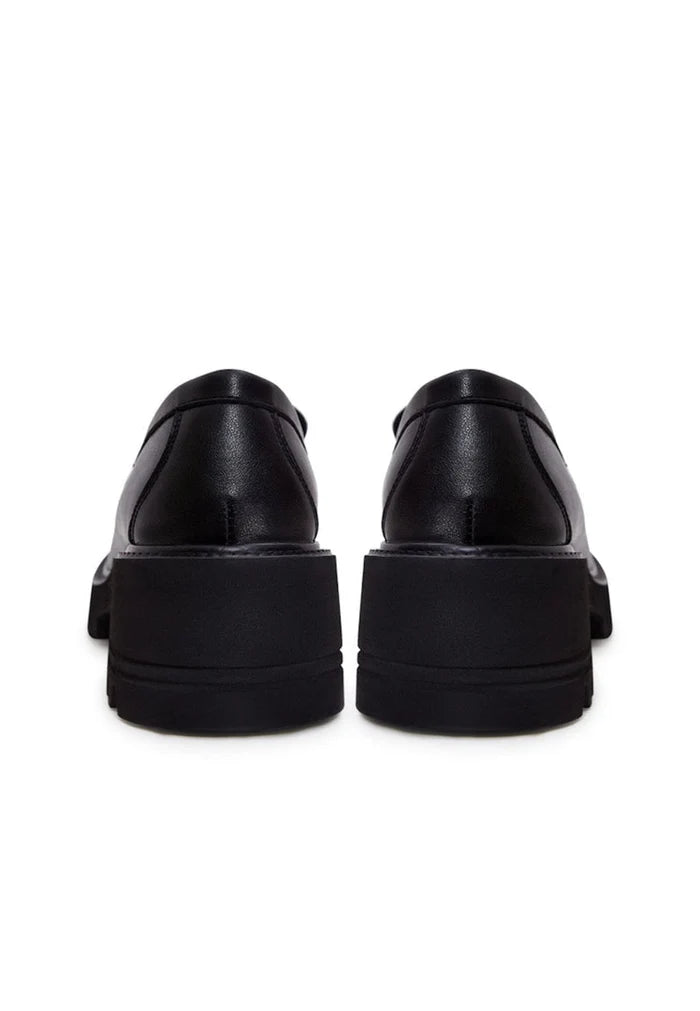 A stylish collection of leather loafers, classic black heels, block heel shoes, and black leather shoes for women.