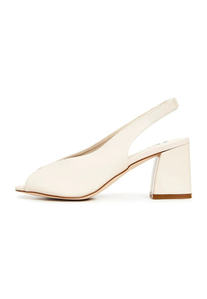 A pair of trendy block heel leather sandals in classic beige, a staple in women's fashion footwear, crafted from high quality leather materials.