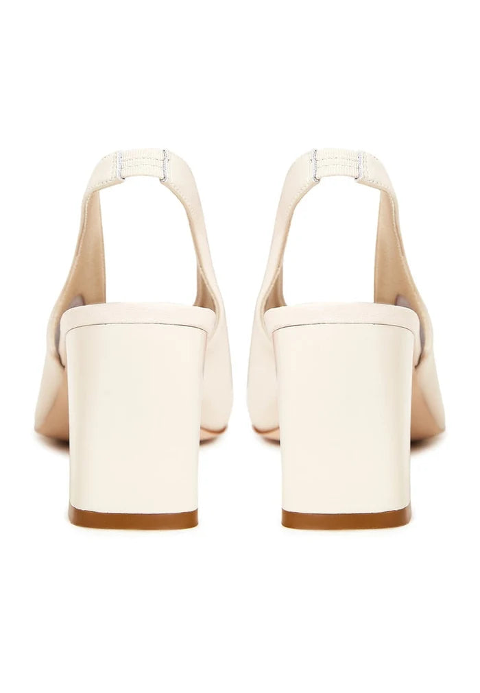 A pair of trendy block heel leather sandals in classic beige, perfect for women's fashion footwear enthusiasts looking for high quality and style.