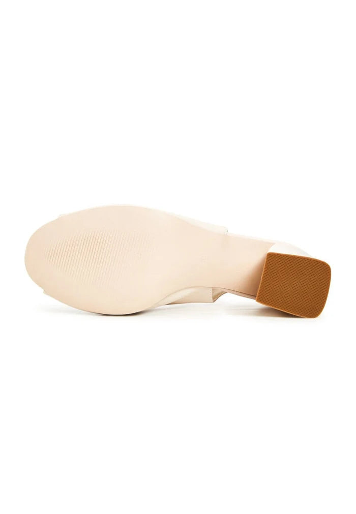 A pair of classic beige leather block heel sandals, the perfect women's fashion footwear choice for a trendy and high-quality look.