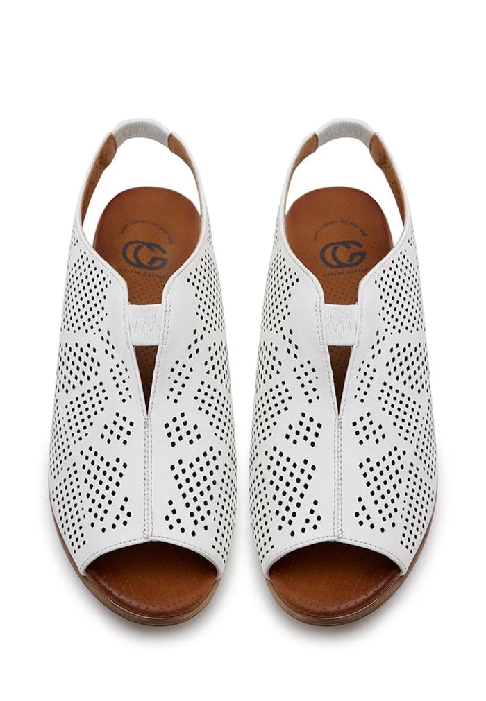 A pair of stylish classic block heeled sandals in white leather for women, perfect for any outfit.