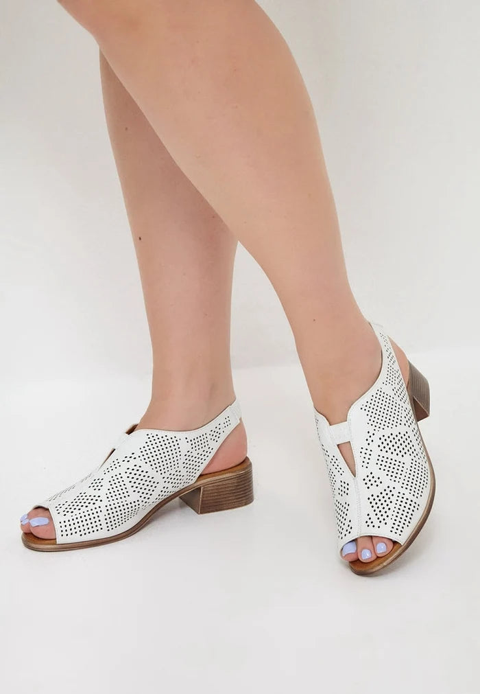 A stylish pair of classic white leather block heel sandals for women.