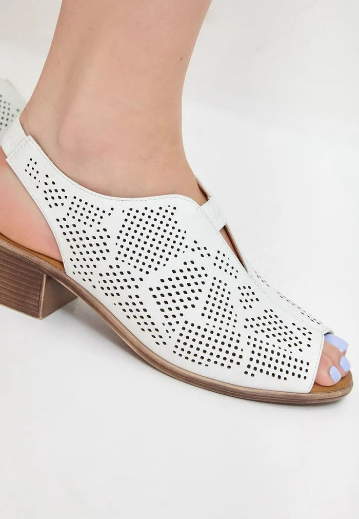 A stylish pair of white leather block heeled sandals for women, the perfect combination of classic elegance and modern design.