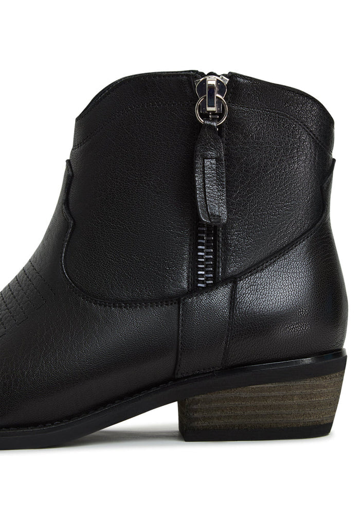 A pair of stylish handmade black leather Vicky cowboy boots with a Western flair.