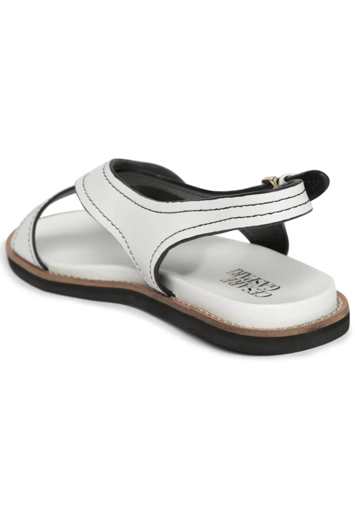 A trendy pair of leather flat sole sandals, perfect for urban style, featuring stylish design.