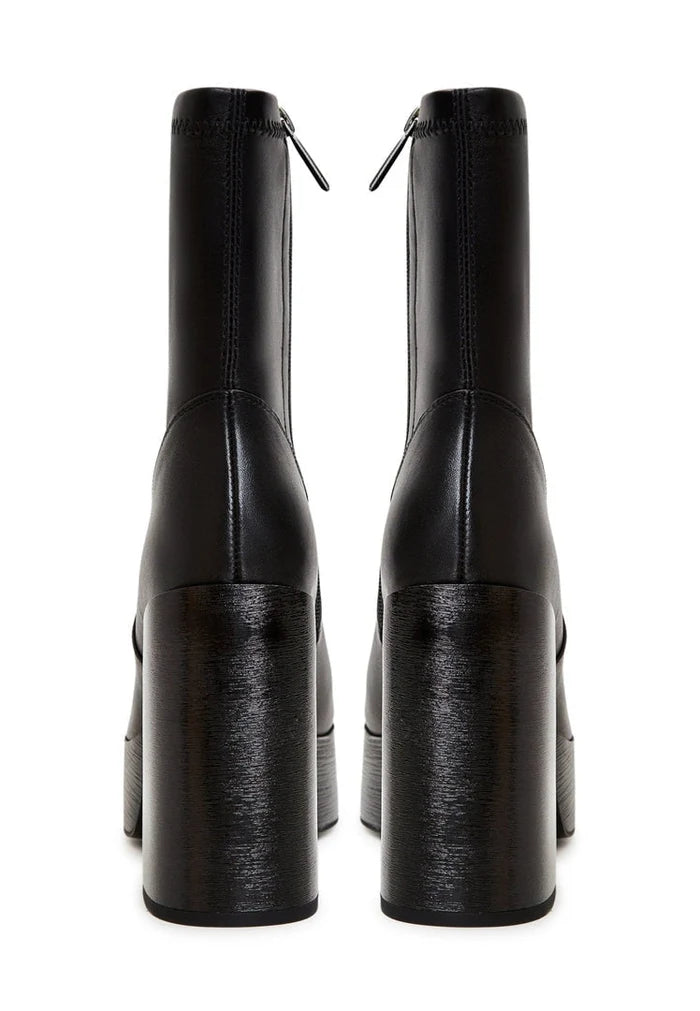 A stylish pair of leather heeled ankle boots for women, perfect for any outfit.