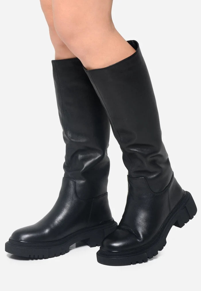 A stylish pair of black leather knee high boots by Anastasia, perfect for women looking for high quality footwear.