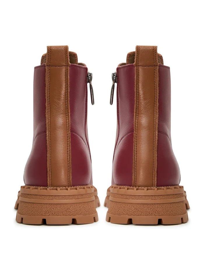 A pair of stylish women's Bordeaux leather ankle lace-up boots, perfect for elevating your fashion footwear collection.