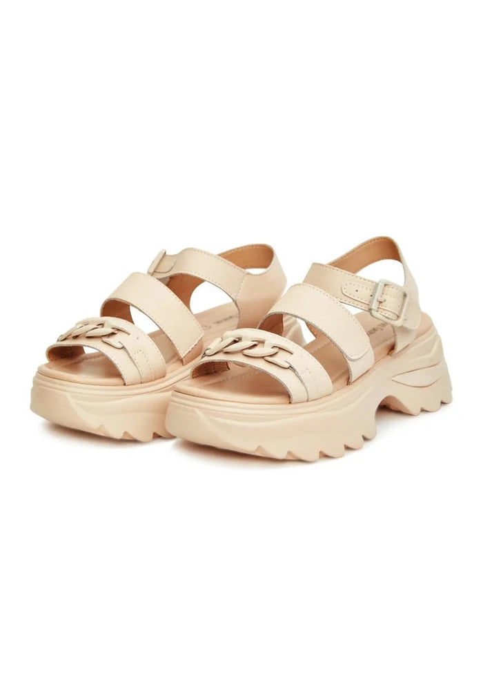 A stylish pair of women's leather platform sandals with a high heel, perfect for a fashionable look.