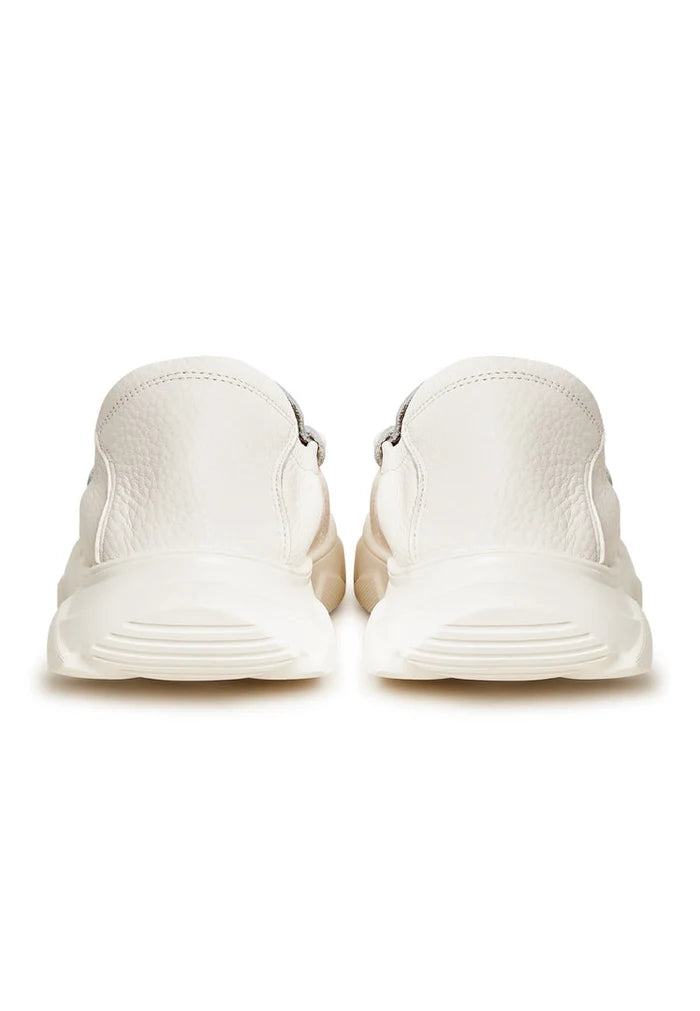 A stylish pair of white leather platform moccasins, known as the Alisa moccasins, perfect for fashion-forward women.