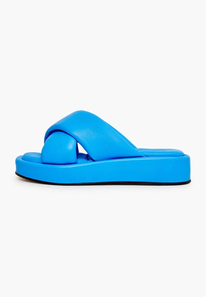 A stylish women's blue leather platform mule shoe with a high heel, perfect as a chic leather slide sandal.