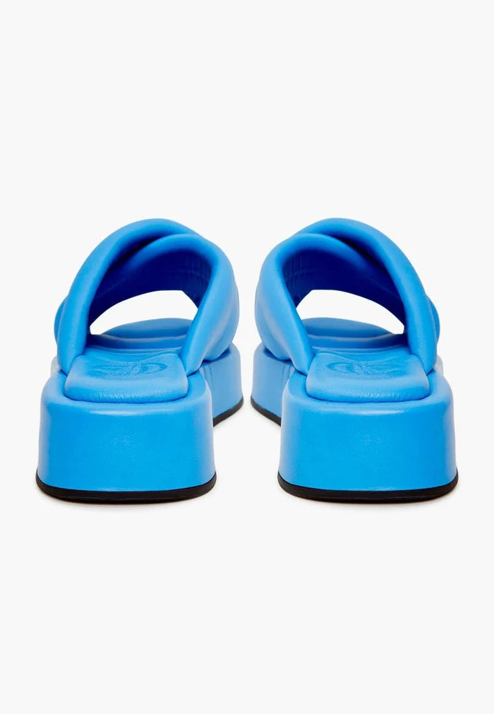 A stylish women's blue leather platform mule high heel sandal, perfect for any fashion-forward outfit.