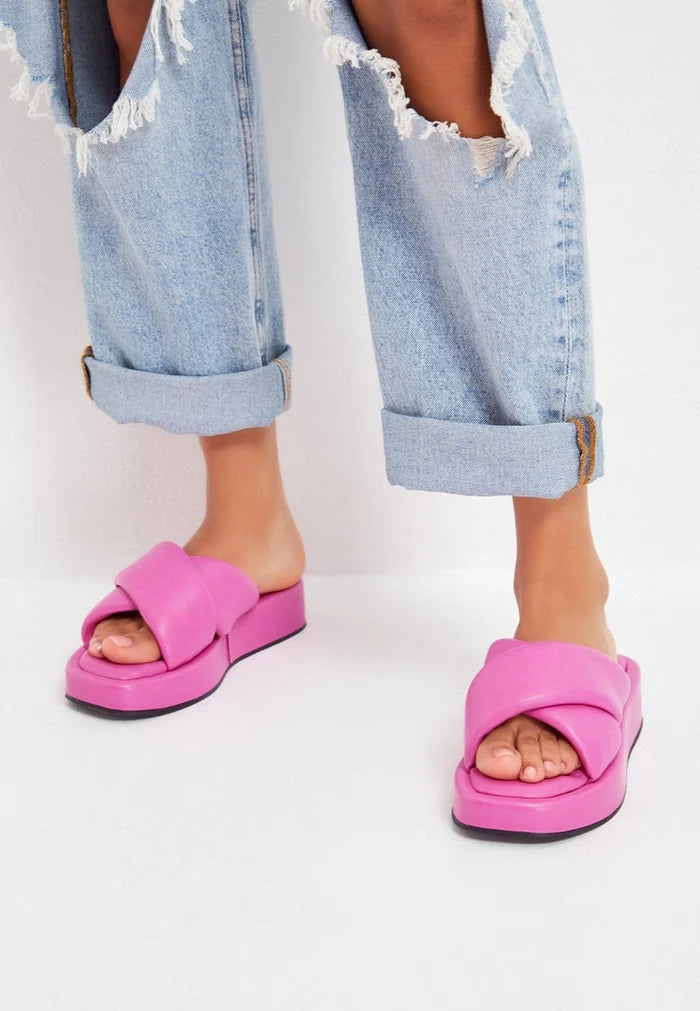 A stylish fuchsia leather platform mule with a chunky heel, perfect for women looking for a fashionable mule sandal.