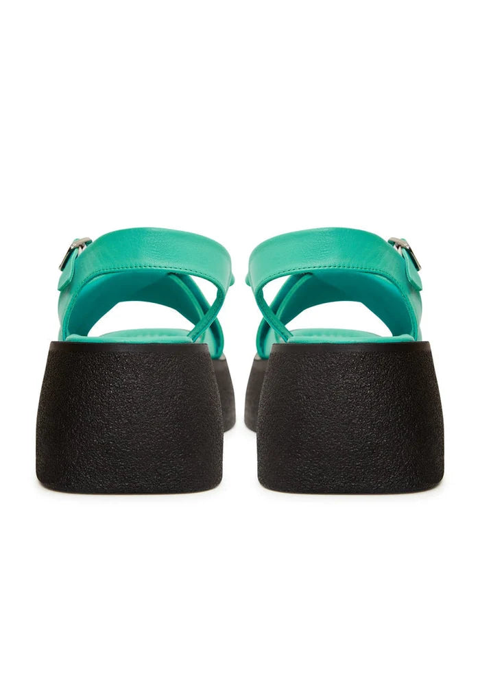 Stylish green leather platform sandals for women, featuring high heels - the perfect choice for fashionable green footwear.