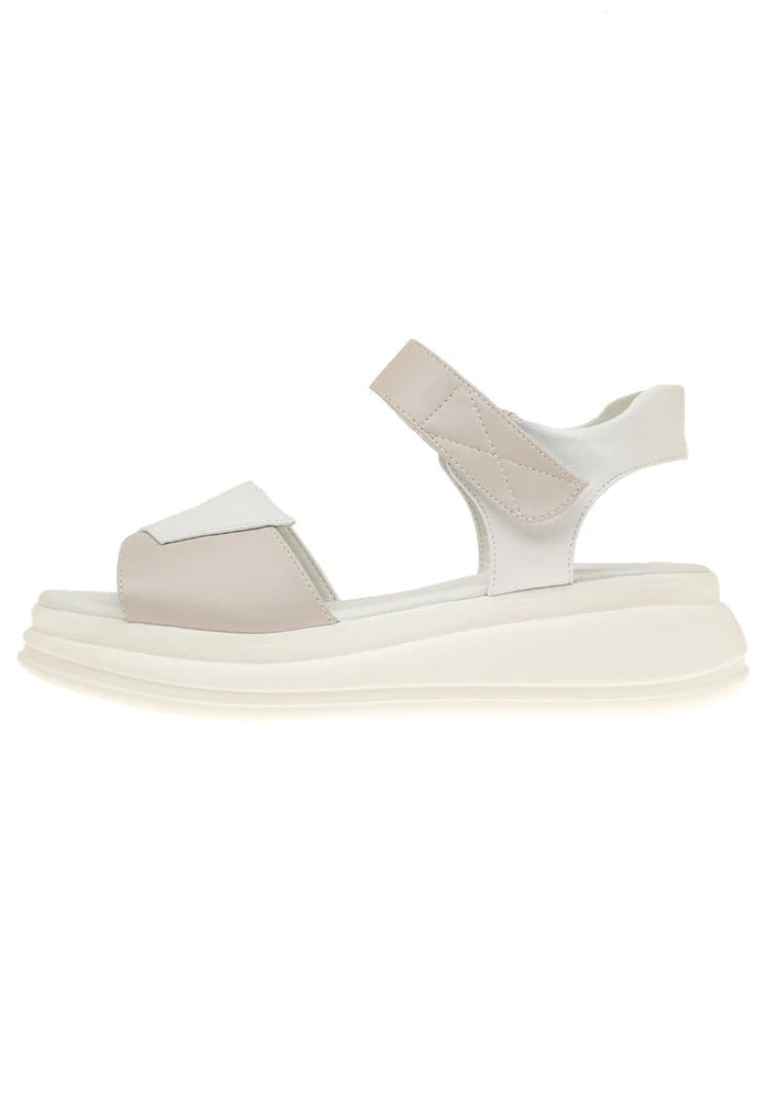 A stylish pair of high heel leather platform sandals with a platform sole design.