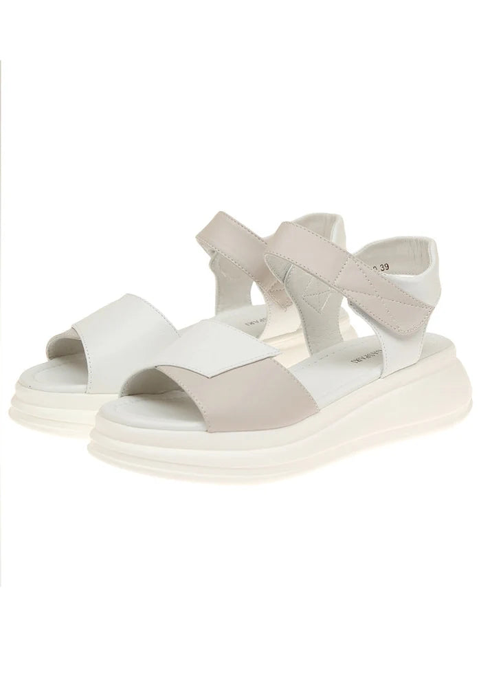 A chic pair of high heel leather platform sandals with a stylish platform sole design.