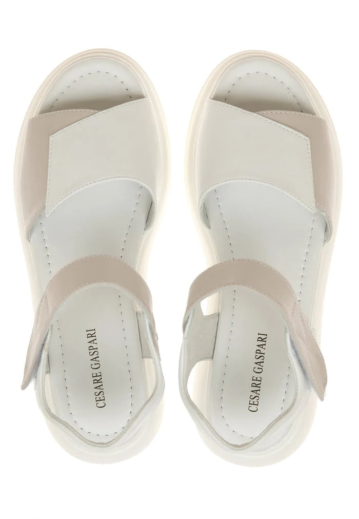 Stylish leather platform sandals with a high heel and platform sole for a fashionable look.