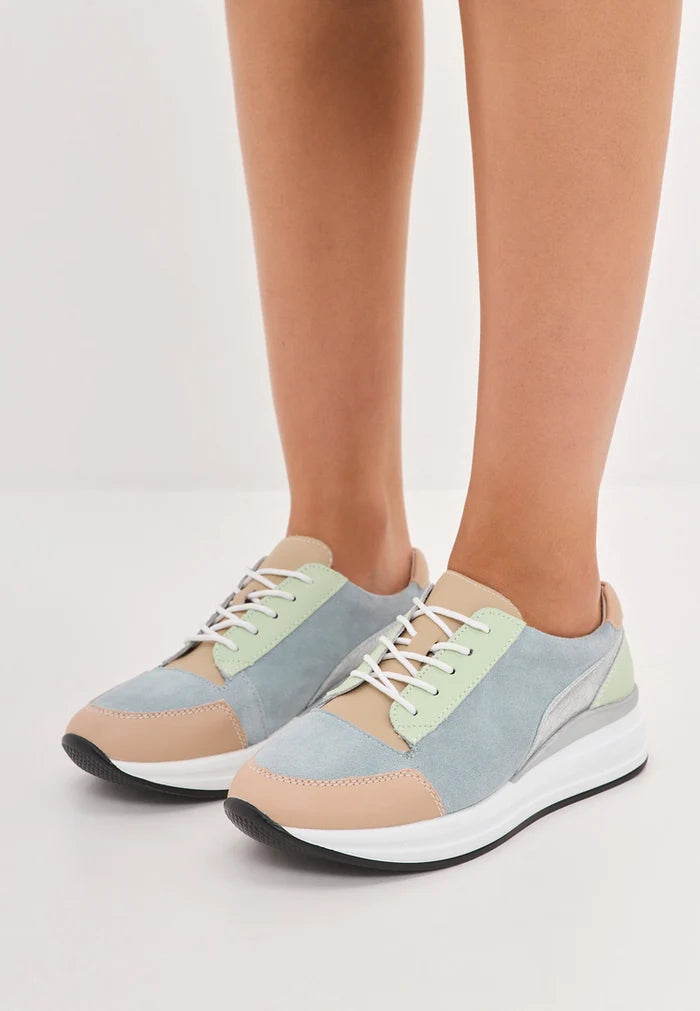 A stylish pair of blue leather sneakers with an Eva sole, perfect for casual outings and daily activities.