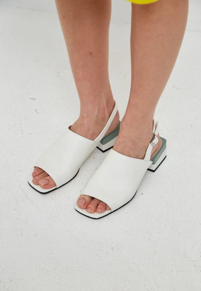 A stylish pair of high-quality leather square heel sandals for women, ideal for summer footwear.